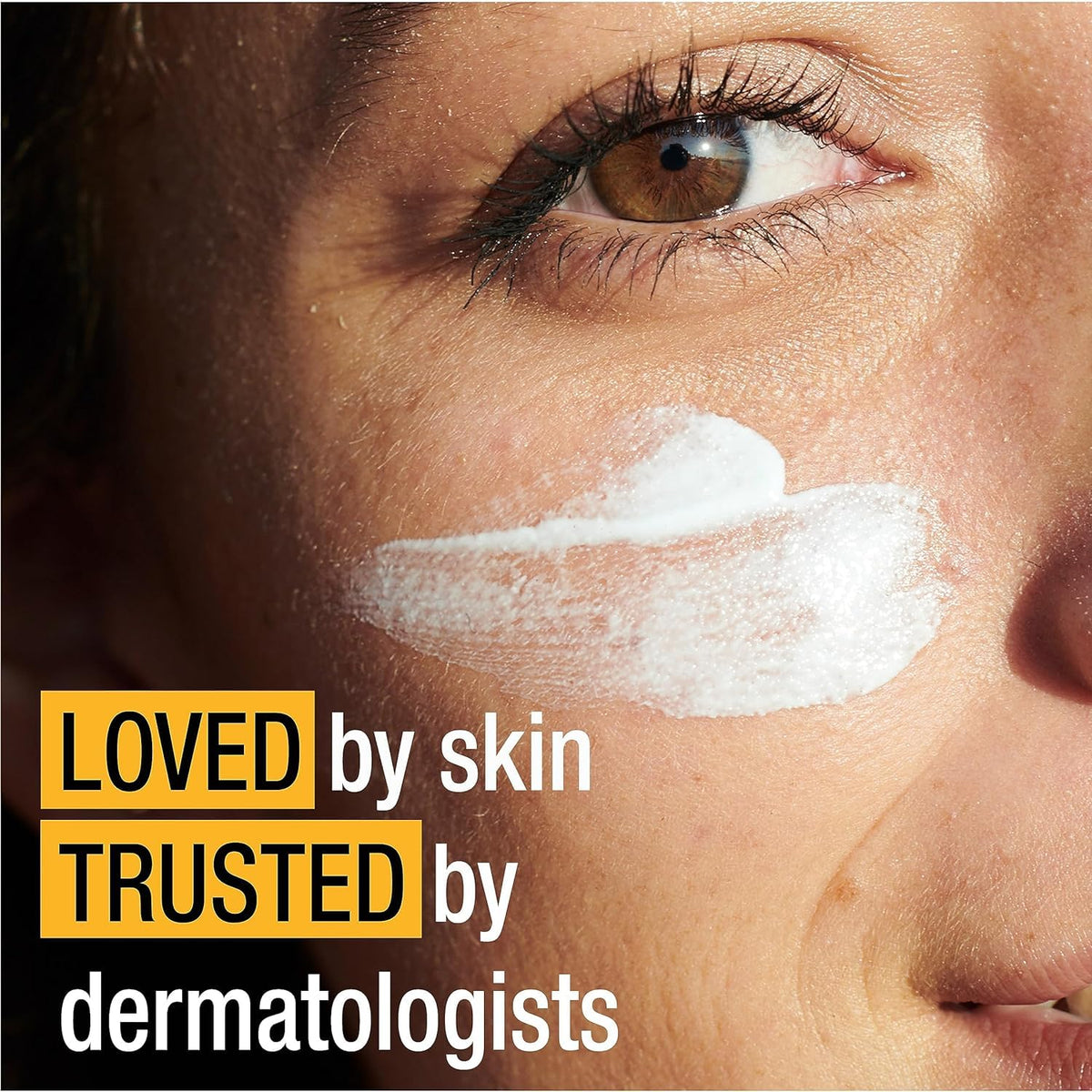 Applying Neutrogena Age Shield SPF 70 to skin for smooth coverage.