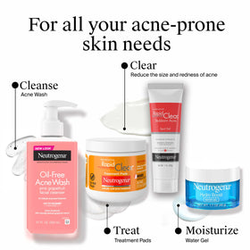 Hand applying Neutrogena Pink Grapefruit Face Wash lather during daily cleansing.