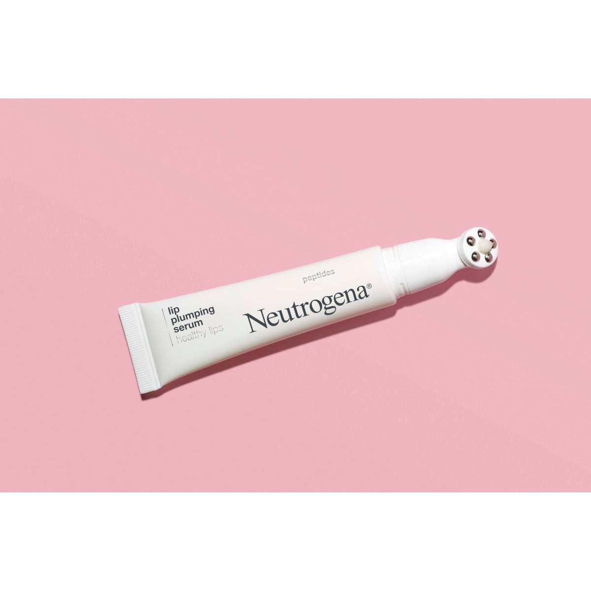 Neutrogena Healthy Lips Plumping Serum applied on lips for a fuller-looking pout.