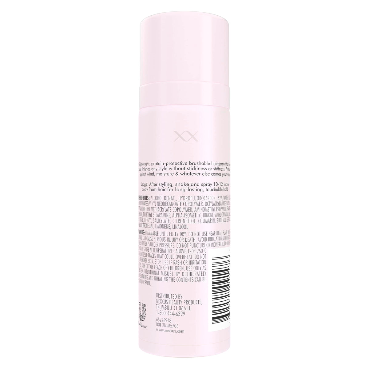 Nexxus Comb Thru Finishing Mist spray close-up with micro-fine mist