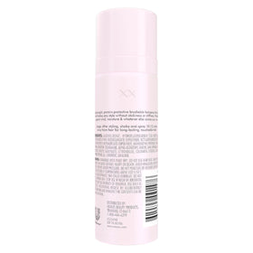 Nexxus Comb Thru Finishing Mist spray close-up with micro-fine mist