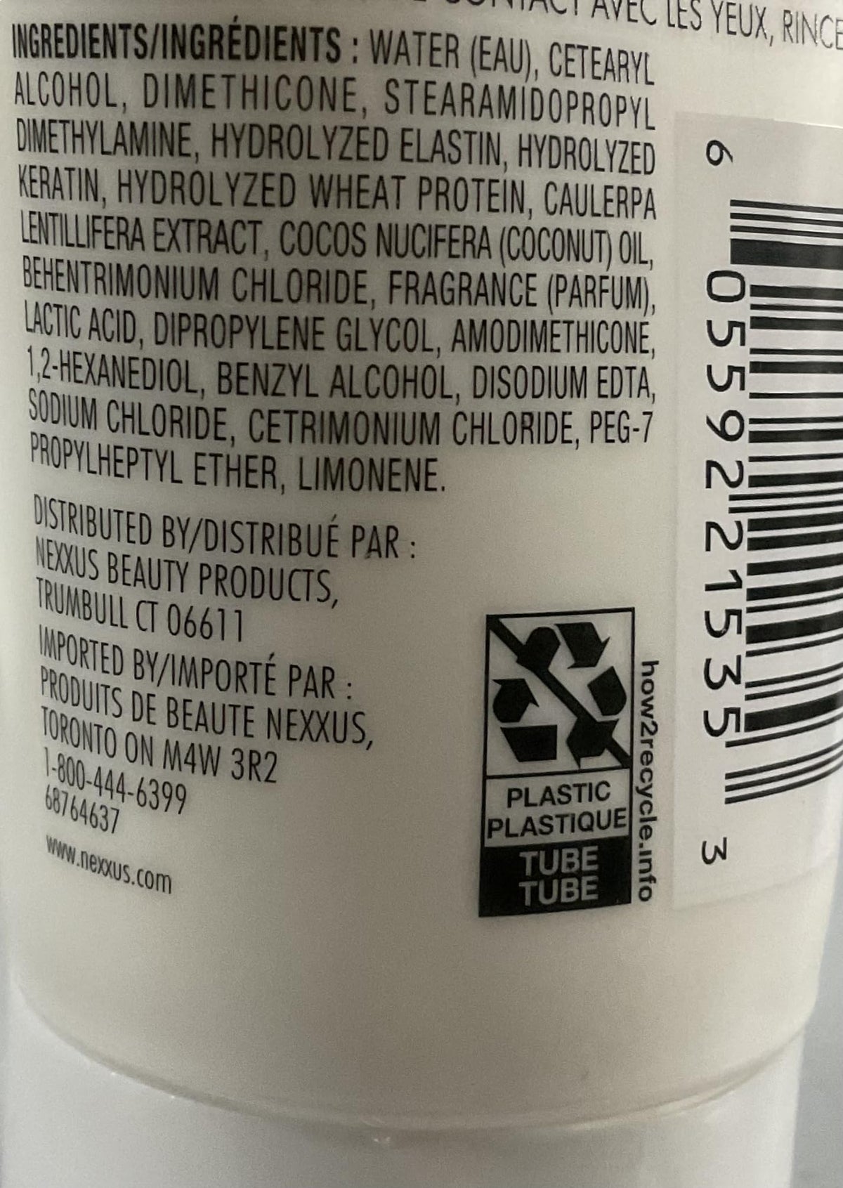 Nexxus Humectress conditioner dispensing-application scene suggests easy hair hydration routine