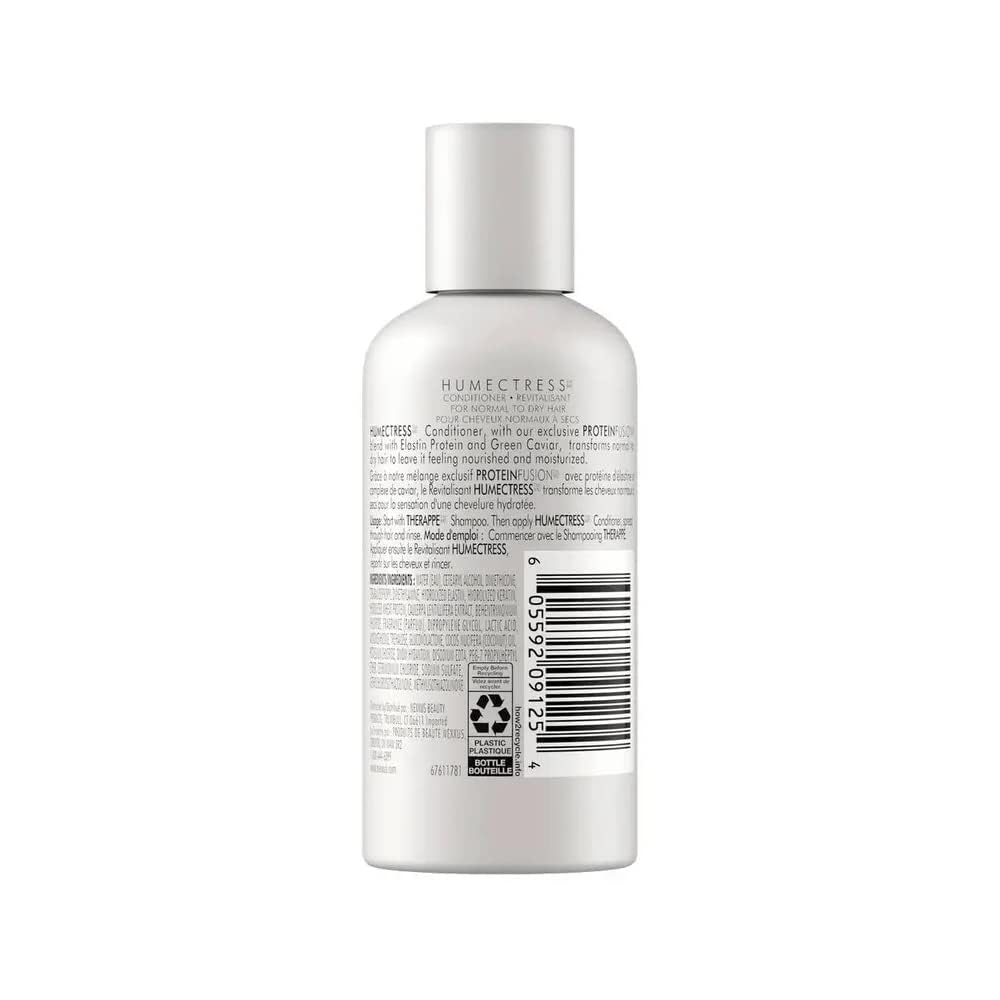 Nexxus Humectress conditioner being applied to hair for smoothness.