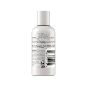 Nexxus Humectress conditioner being applied to hair for smoothness.