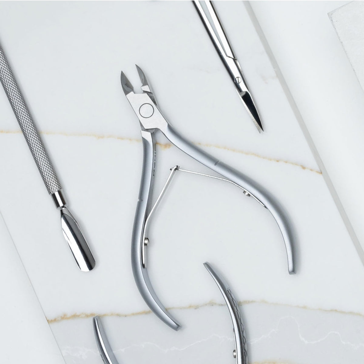 NGHIA Cuticle Nipper ergonomic straight short handle supports small hands.