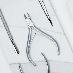 NGHIA Cuticle Nipper ergonomic straight short handle supports small hands.