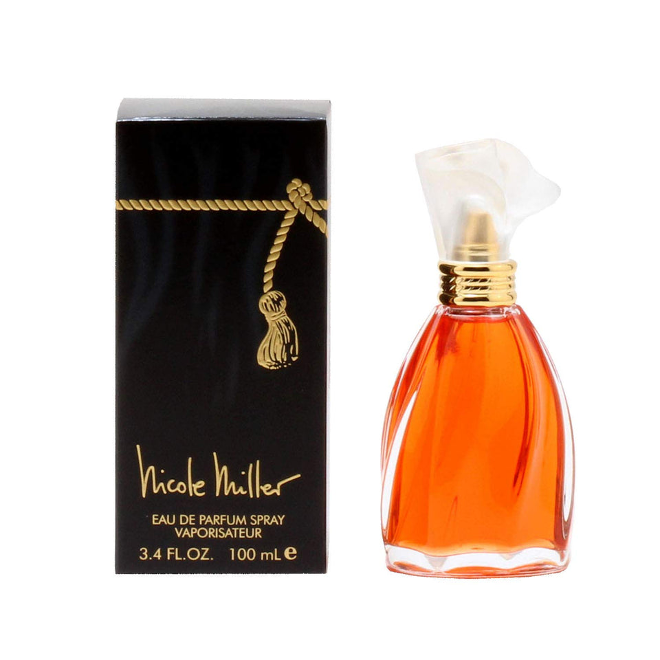 Nicole Miller eau de parfum bottle front on a refined vanity