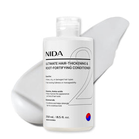 NIDA Ultimate Hair-Thickening Conditioner bottle demonstrates fuller-looking hair.