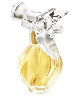 Nina Ricci L'air du Temps packaging close-up, vintage fragrance heritage for special occasions.