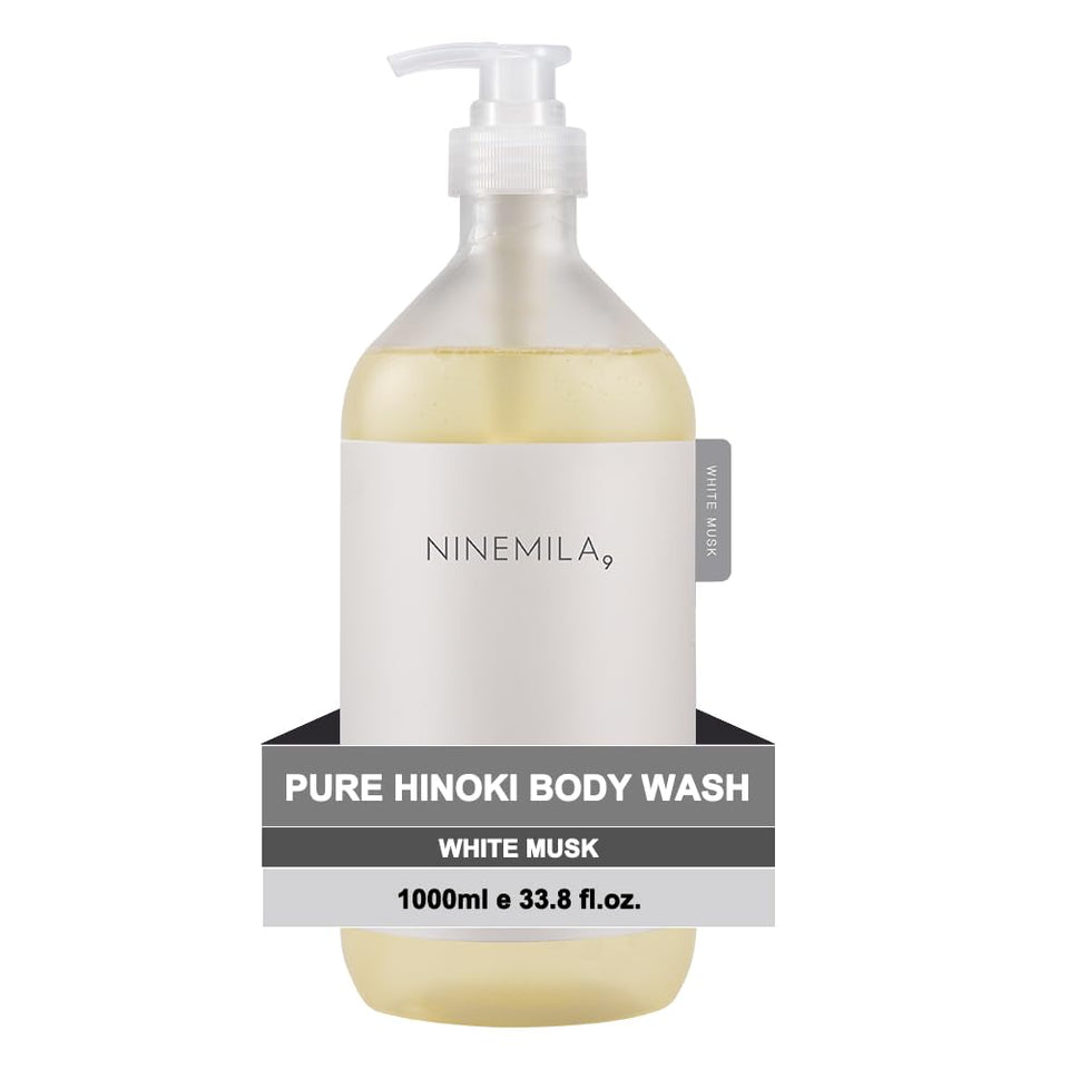 NINEMILA Pure Hinoki Body Wash bottle on a clean shelf for daily calming cleanse.