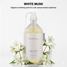 Spa-like shower setup featuring NINEMILA Hinoki bottle for a relaxing routine.
