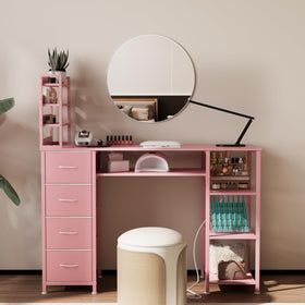 NinPeen manicure table pink open shelves ideal for tools and polish bottles.