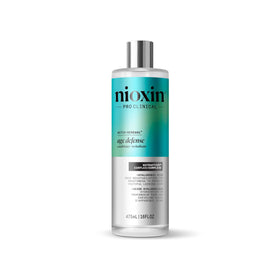 NIOXIN Age Defense Conditioner bottle showing lightweight moisture for aging hair