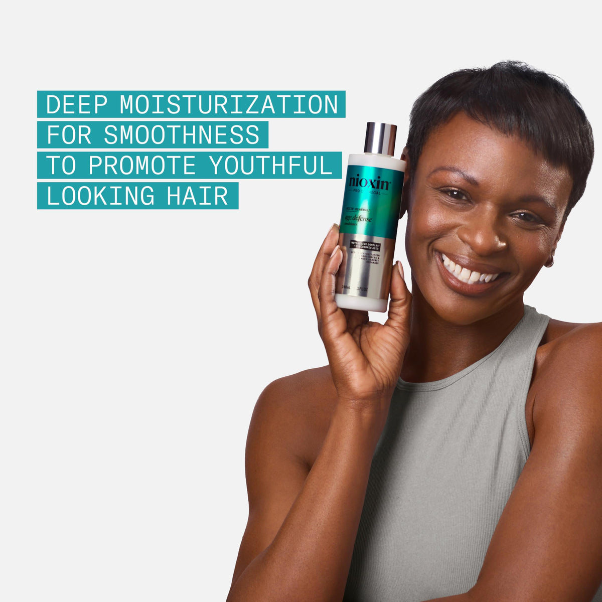 NIOXIN Age Defense Conditioner cream texture close-up highlighting deep hydration