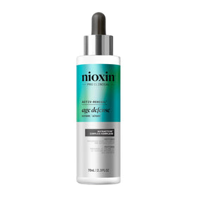 Nioxin Age Defense Serum bottle with pump for easy application and scalp care