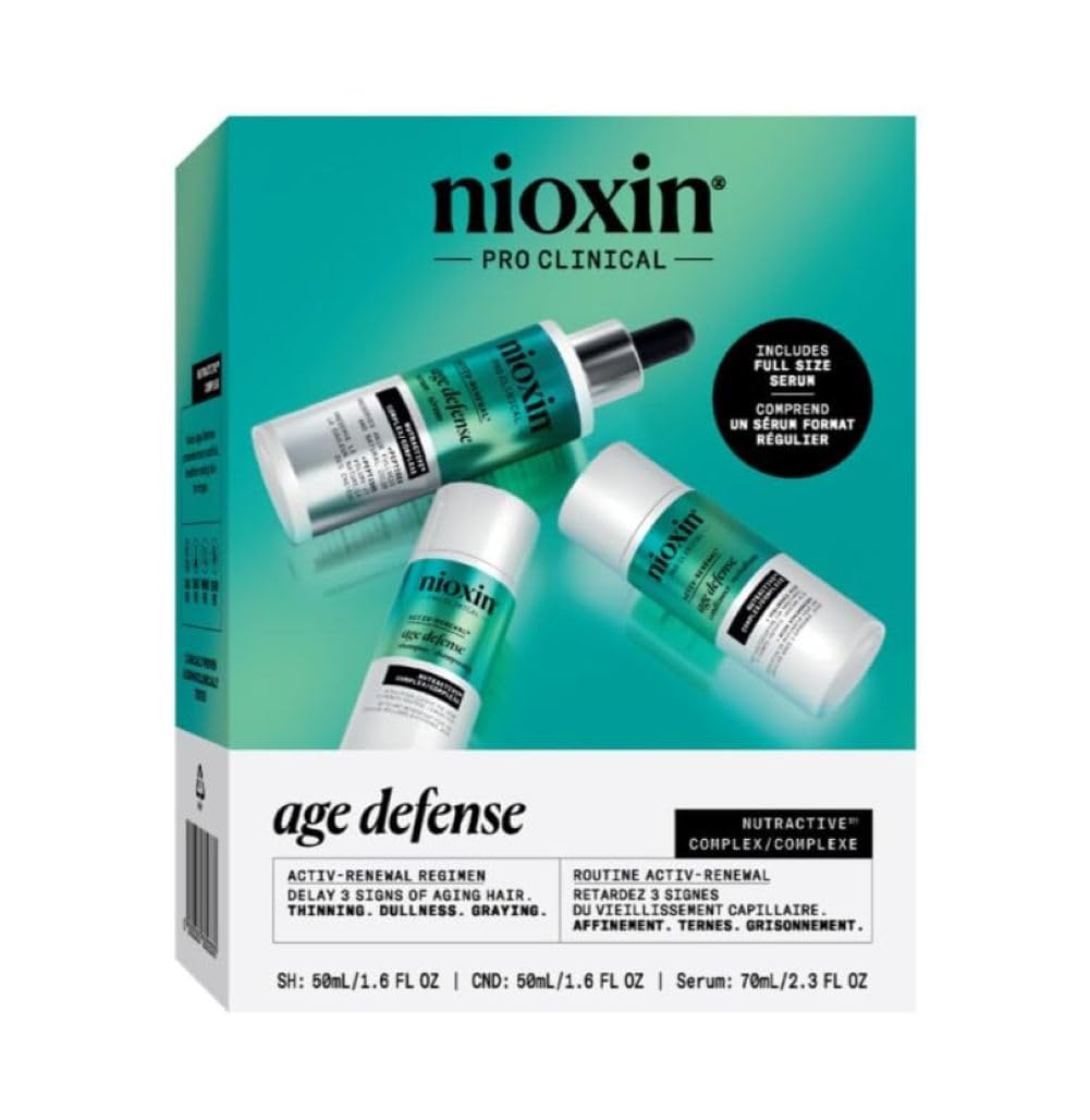 Nioxin Age Defense Shampoo bottle purifies the scalp for fuller-looking roots.