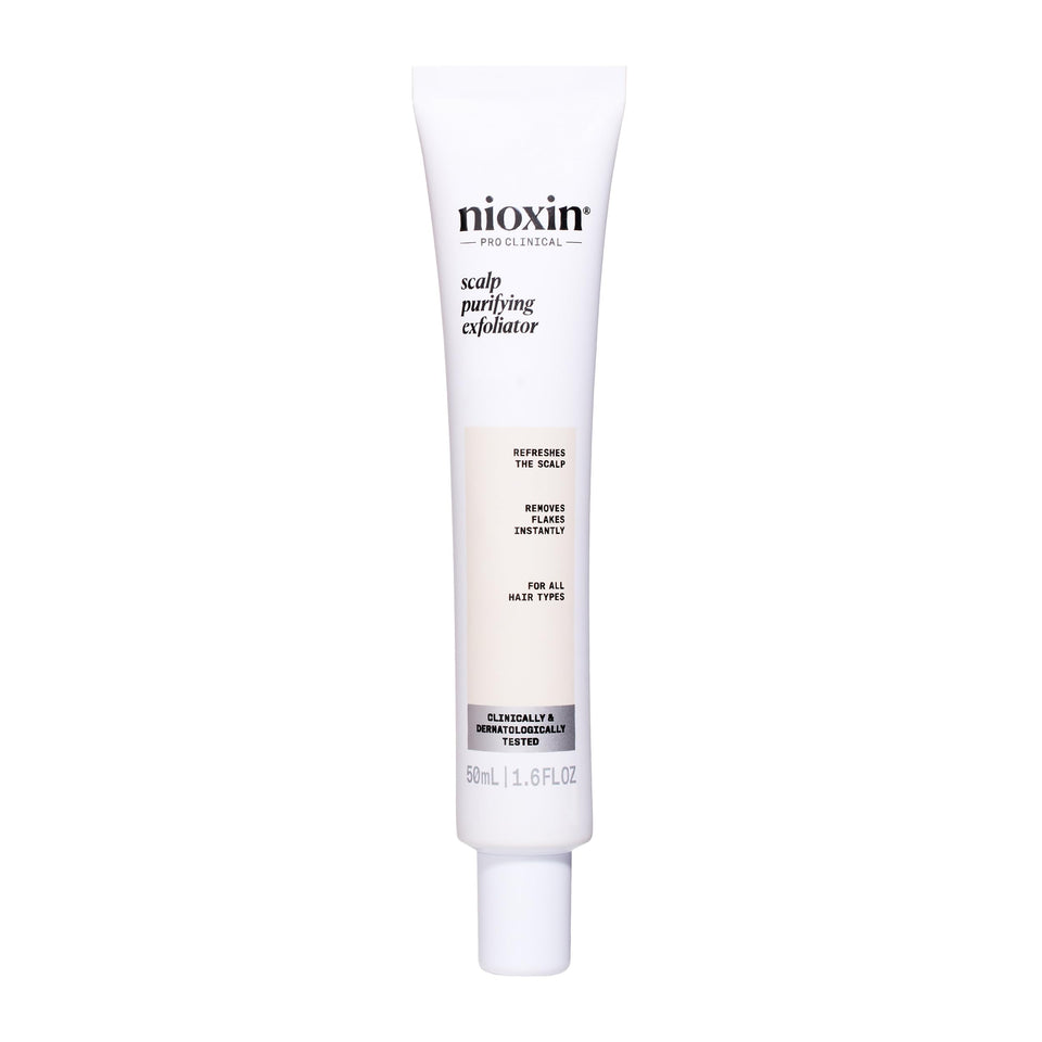 NIOXIN Purifying Exfoliator bottle promotes a refreshed scalp