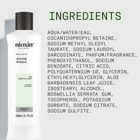 Applying NIOXIN Scalp Relief to irritated scalp for calm relief