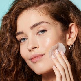 Pad on face close-up from Nip + Fab Glycolic Fix Night Pads Extreme XXL showing exfoliation
