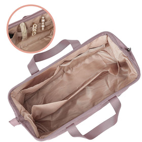 NISHEL peach-pink travel bag with partition protecting wand and dryer during transit