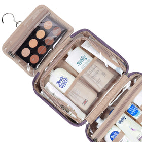 Interior compartments of NISHEL purple bag keeping bottles upright for easy packing