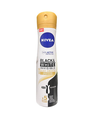 NIVEA Black and White Silky Smooth deodorant spray demonstrates quick absorption and fresh underarms.