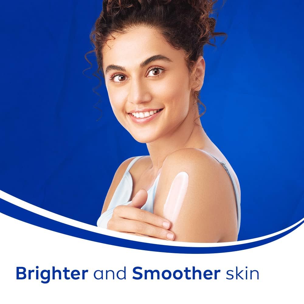Applying NIVEA Natural Glow lotion on the arm to demonstrate texture