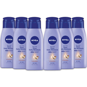 NIVEA Shea Nourish bottle front with glow and 48-hour moisture emphasis