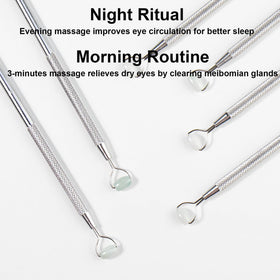 NKQ eyelid massage wand sits beside care instructions for easy setup.