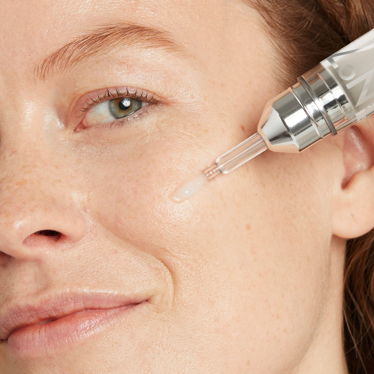 Close-up of No7 Serum texture showing quick hydration absorption