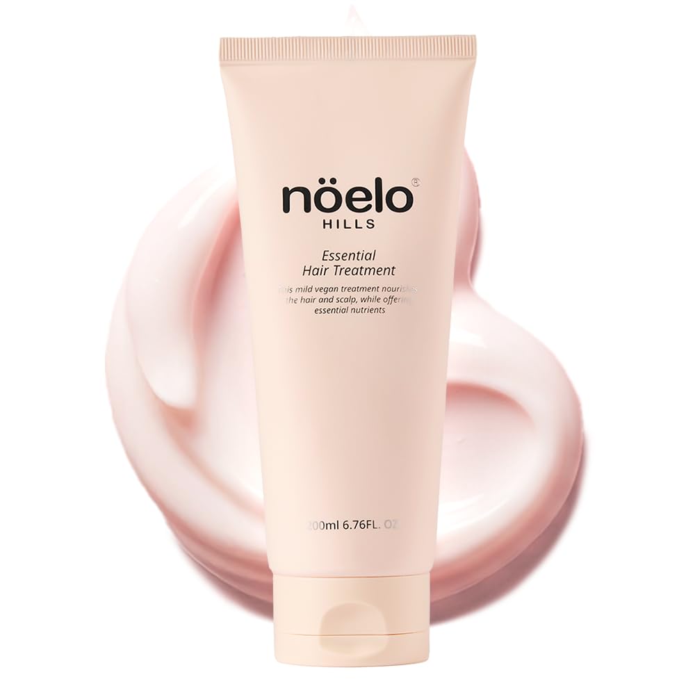 Noelo Hills Hair Treatment bottle pour demonstrates nourishing daily use.