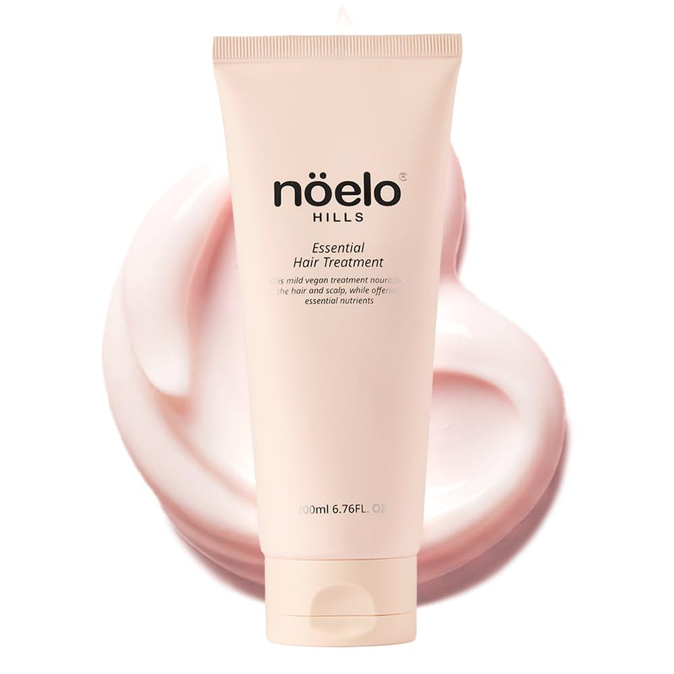Noelo Hills Hair Treatment bottle pour demonstrates nourishing daily use.