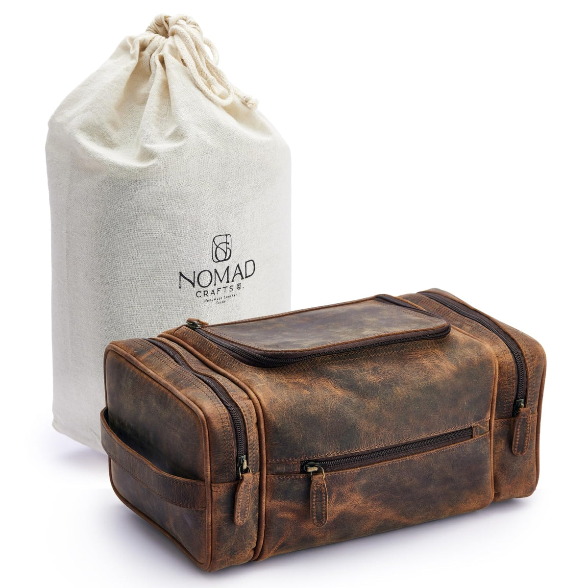 NomadCraftsCo extra-large leather toiletry bag open lid for easy access.