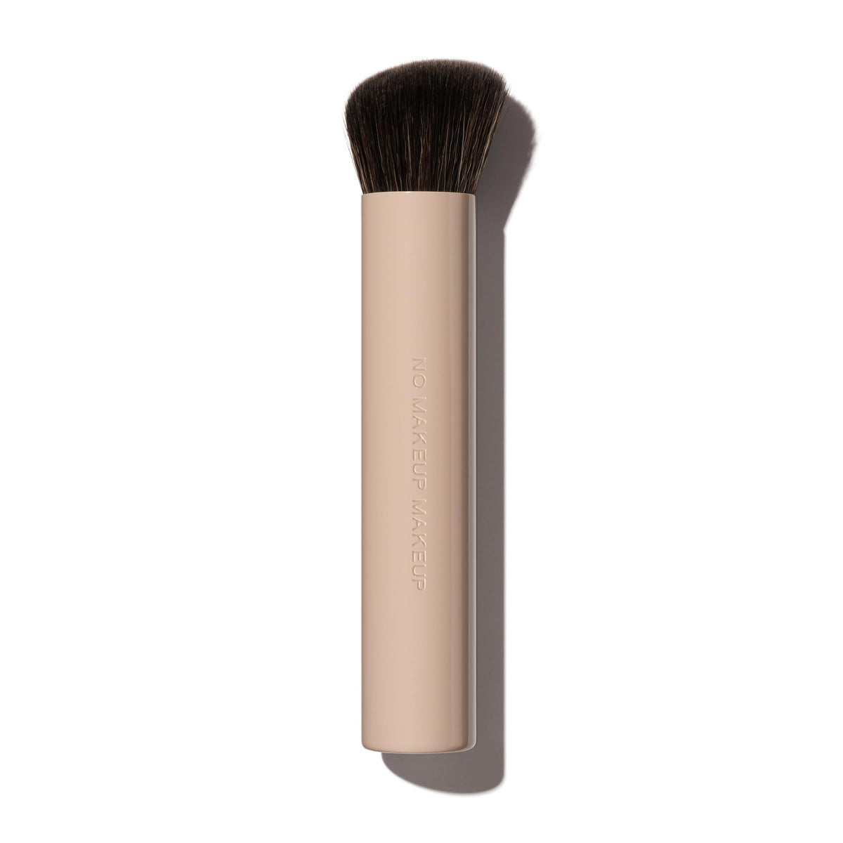 No Makeup Makeup Foundation Brush with a soft-slanted top for seamless blending.
