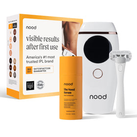 Nood Flasher 2.0 device held in hand for at-home IPL treatment