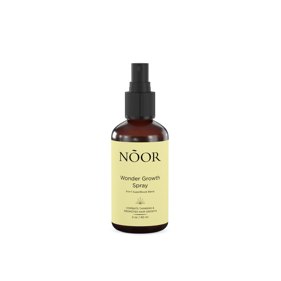 NOOR HAIR Wonder Growth Spray bottle for daily fuller hair routine.