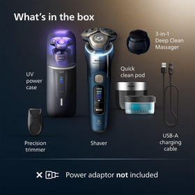 Norelco i9000 Prestige Ultra kit shows complete grooming setup.
