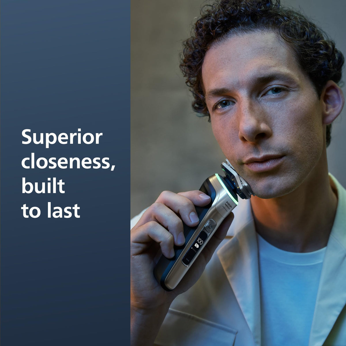 Norelco Shaver Series 9000 side profile showing ergonomic grip for wet and dry shaving.