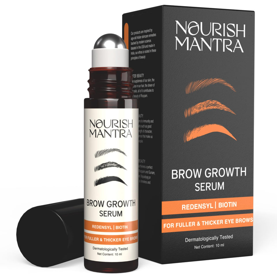Nourish Mantra Eyebrow Growth Serum bottle on a vanity, suggesting fuller brows.