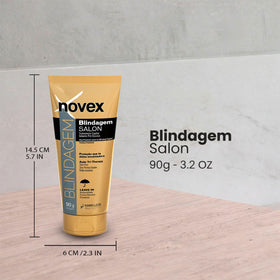 NOVEX application on hair strands demonstrates lightweight formula detangling and ease of styling