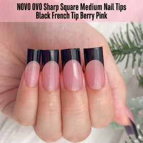 NOVO OVO black French tip close-up highlighting dramatic contrast and quick wear.