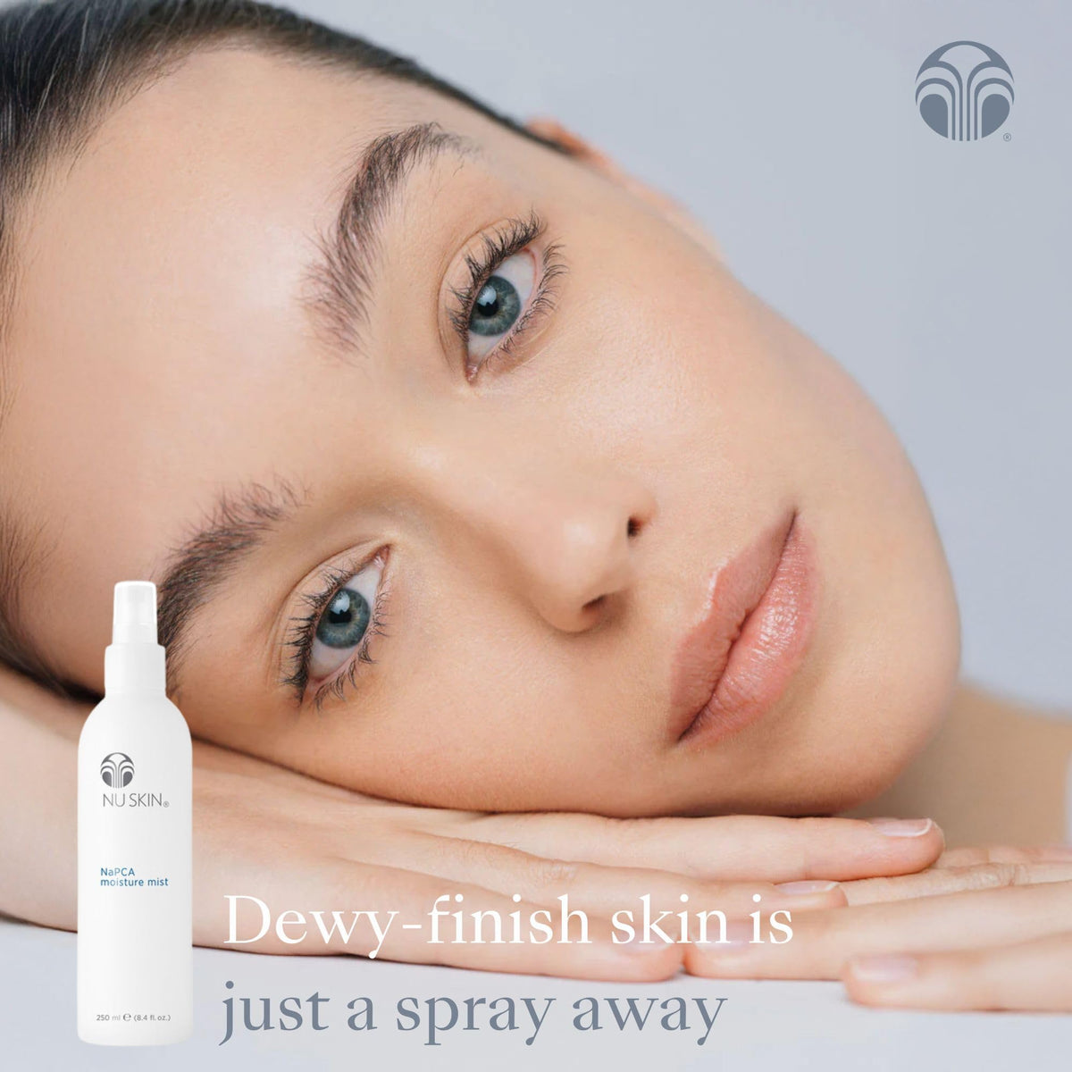 Nu Skin NaPCA Moisture Mist being applied to the face for cooling hydration.