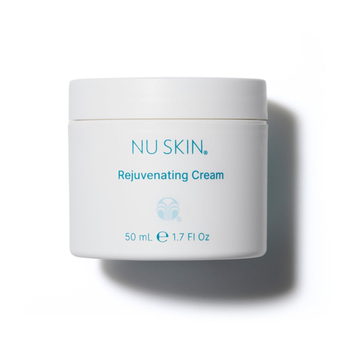 Nu Skin Rejuvenating Cream tube closeup shows hydration for dry skin.