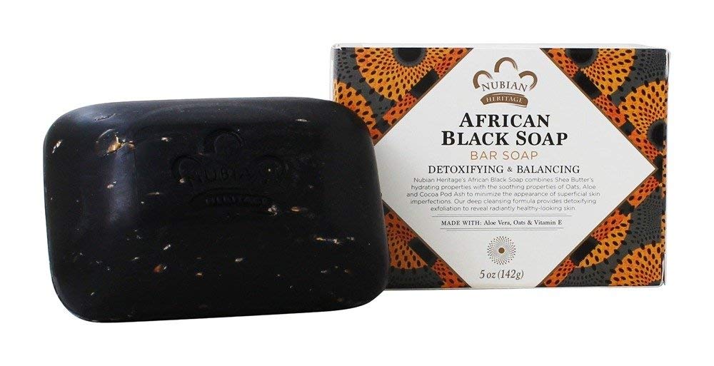 Nubian Heritage African Black Soap Bar close-up texture highlights exfoliating feel for radiant skin care
