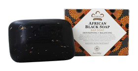Nubian Heritage African Black Soap Bar close-up texture highlights exfoliating feel for radiant skin care