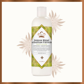 Nubian Heritage lotion closeup reveals creamy consistency and moisturizing potential.
