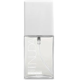 Nuda CloudMist bottle spray applying buildable glow to fair-to-medium skin.