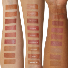 Nudestix Nudies Bronze Stick applied over makeup for lasting bronzed effect.