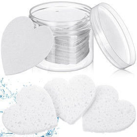 Nuenen heart-shaped facial sponges in container for easy storage.