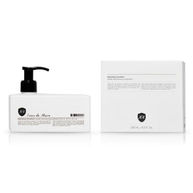 Number 4 Hydrating Conditioner bottle pour for daily moisture and frizz reduction.